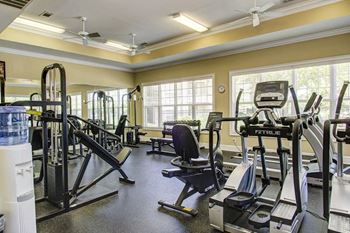Fitness Center with Advanced Cardio and Free Weights at Abberly Place Apartments in Garner, NC